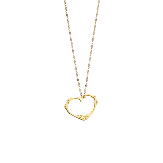 A gold chain necklace featuring a textured, open heart-shaped pendant, presented on a clean white background.