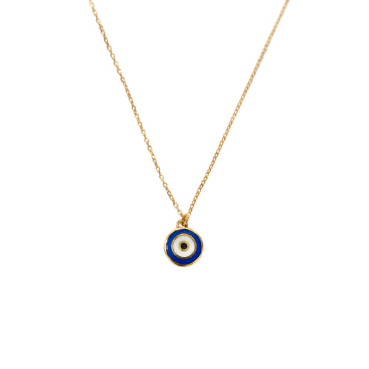 A gold chain necklace with a circular evil eye pendant featuring blue, white, and black enamel details, shown against a plain white background.