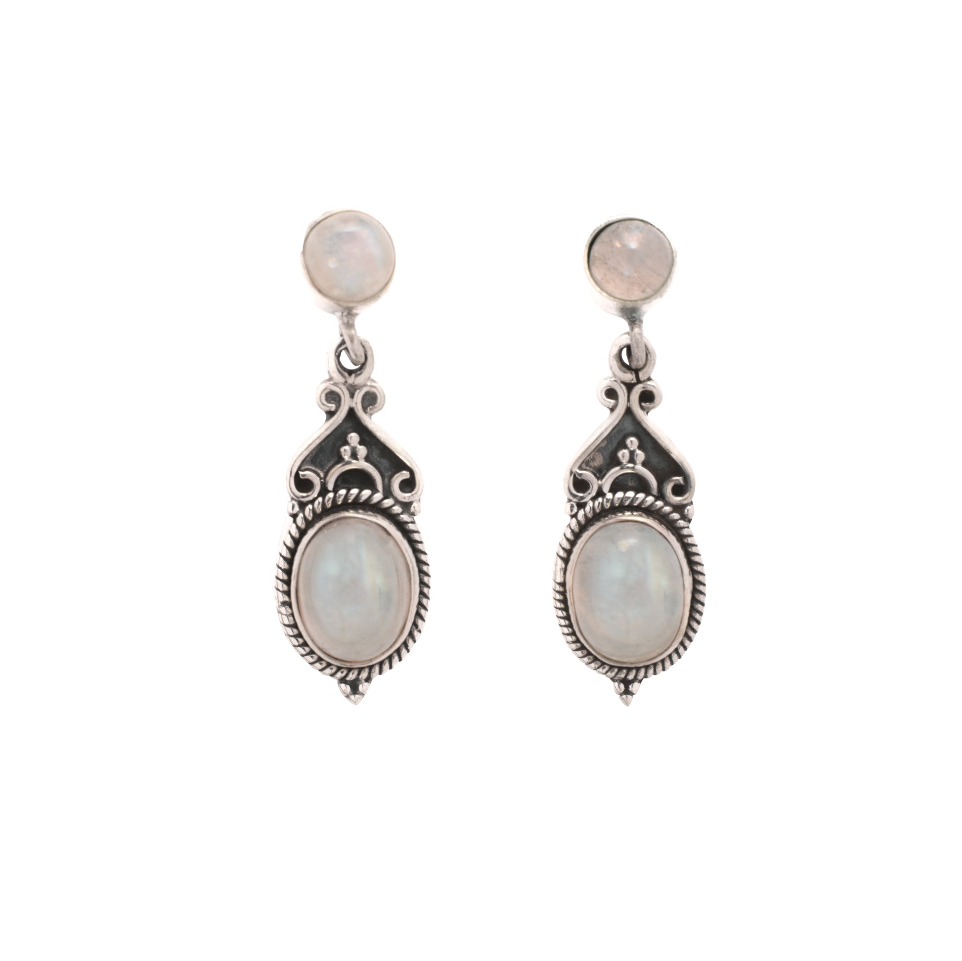 Pair of silver earrings with moonstone stones on a white background