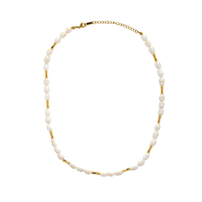 Pearl necklace with gold accents on a white background