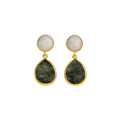 A pair of gold drop earrings featuring a round white moonstone stud on the top and a teardrop-shaped dark green stone on the bottom, set in gold bezels against a plain white background.