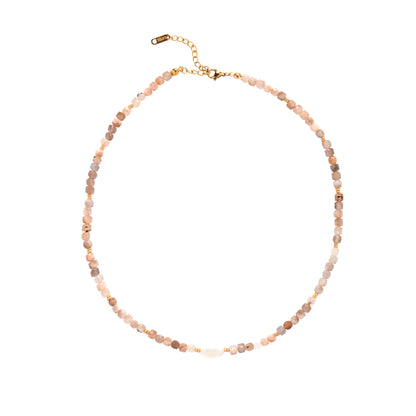 Pearl and Rose Quartz Necklace with multicolored beads on a white background